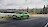 Zölds színű Ford Focus ST halad az úton