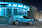 Ford Transit Courier áll egy kéken kivilágított épület előtt