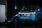 Kék Ford E-Transit Custom töltőre helyezve