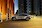 Ford Mustang Mach-E köztéri töltőpontnál parkol