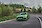 Zöld Ford Focus ST halad a kanyarban