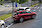 Ford Kuga Hybrid kiáll a parkoló autók közül